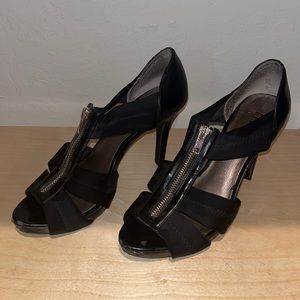Woman’s black strappy heel with front zipper size 9